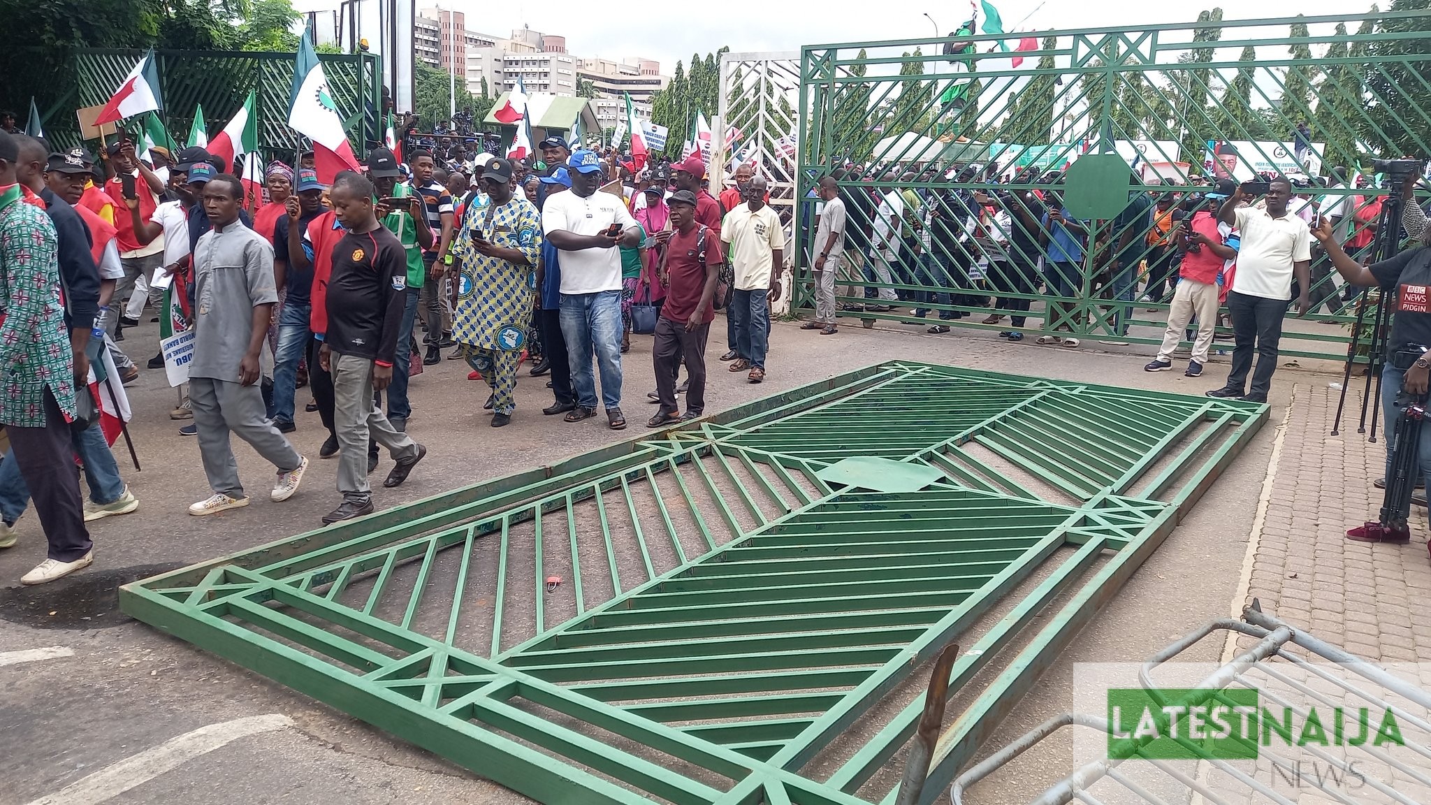 JUST IN: Protesters Pull Down National Assembly Gate  