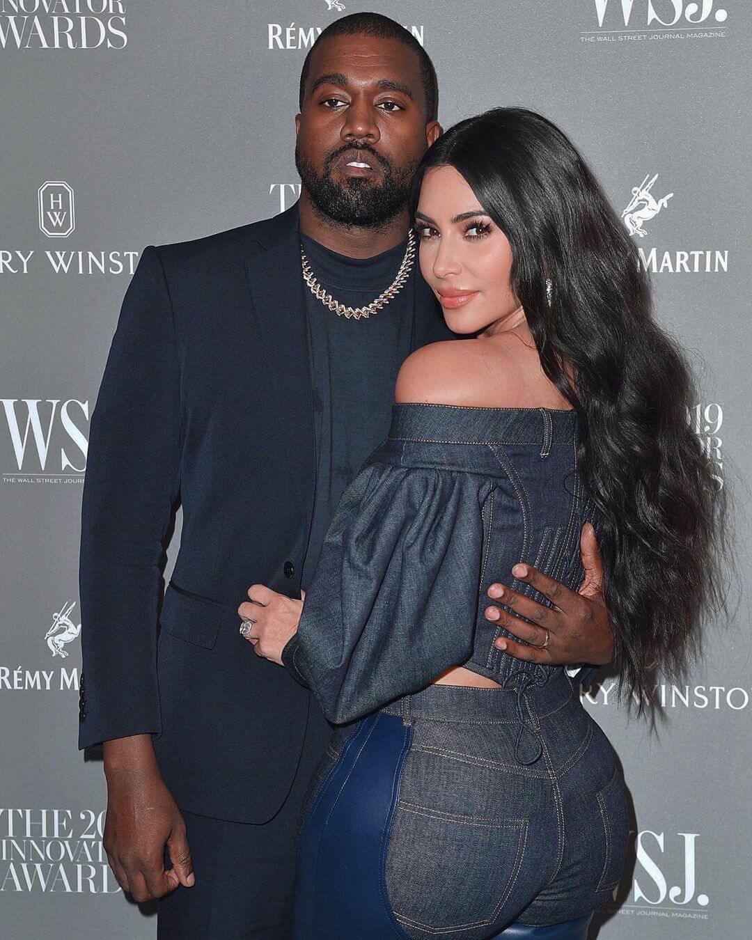 With her husband, Kanye West