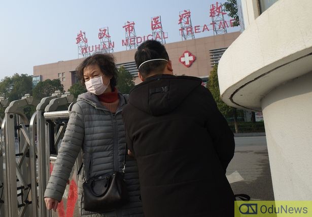 citizens covering their nose