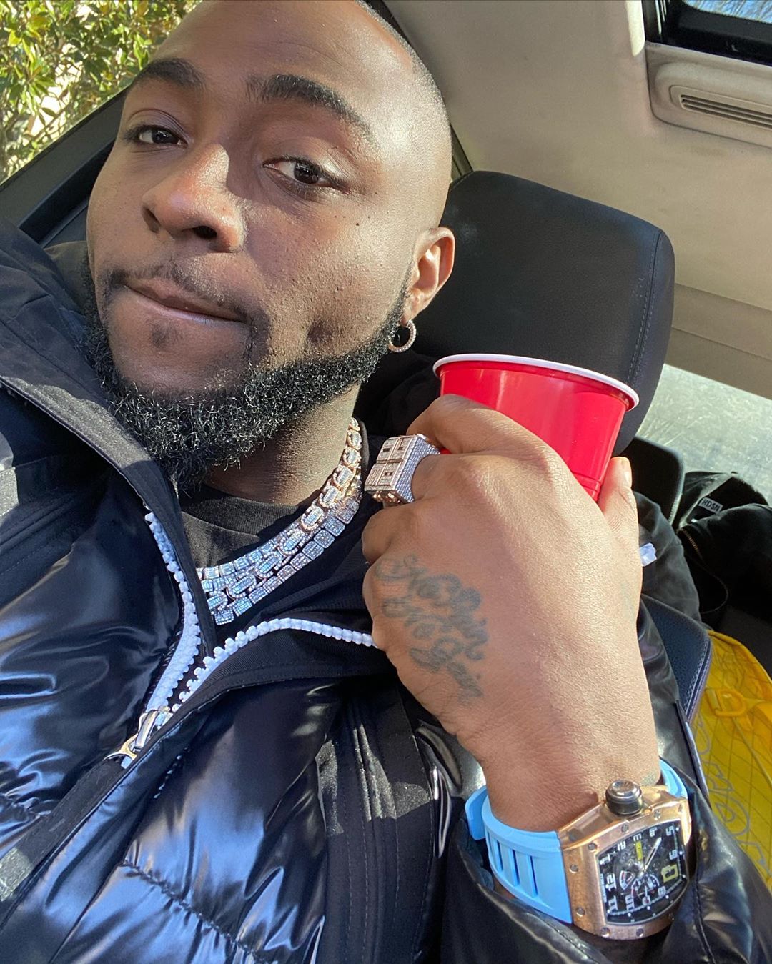 Fan Mocks Davido,Tells Him To Stop Wearing Suit