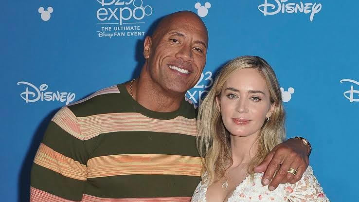 Dwayne Johnson & Emily Blunt To Play Superpowered Couple In ‘Ball & Chain’