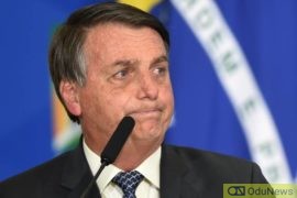 Brazil's President Bolsonaro Threatens To "Pound Punches" On Reporter's Mouth  