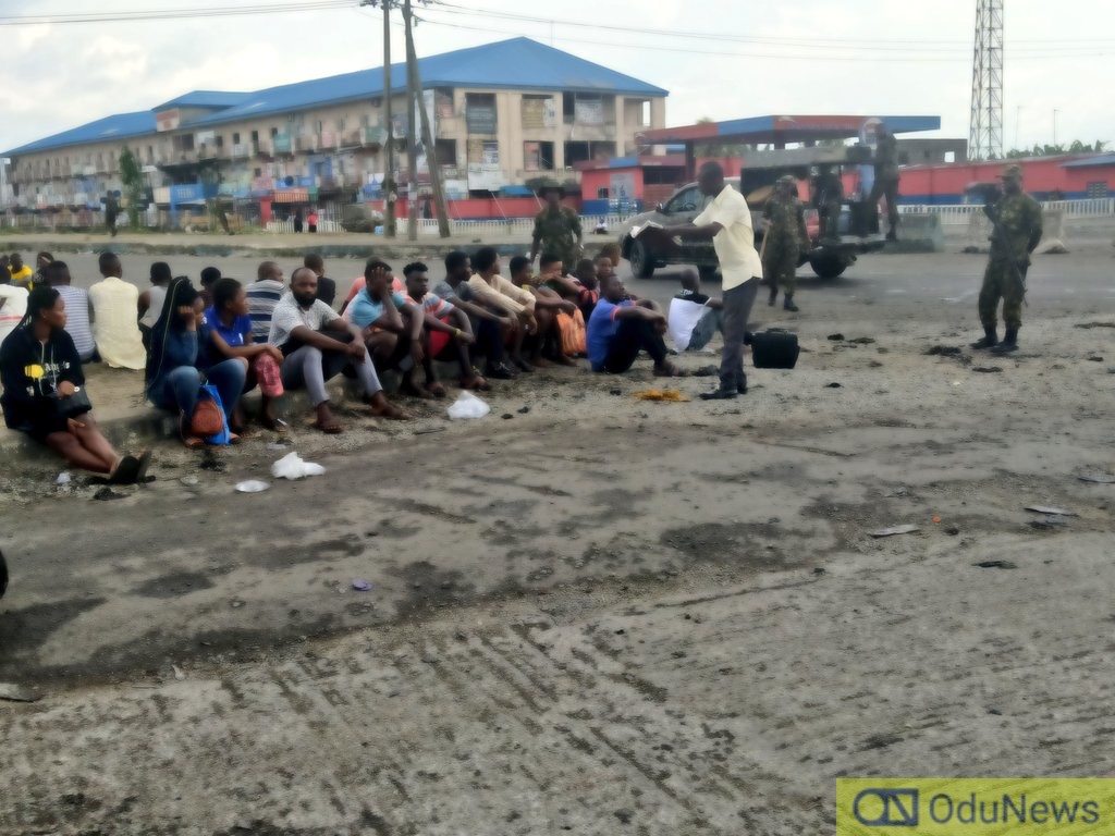 The Moment Curfew Violators Were Made To Sing Praises By Soldiers in Warri [VIDEO]