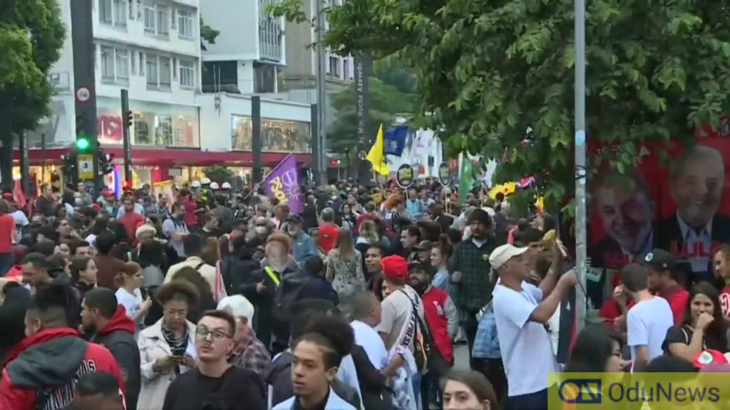 Tens of thousands take to the streets in Brazil to condemn violent riots  