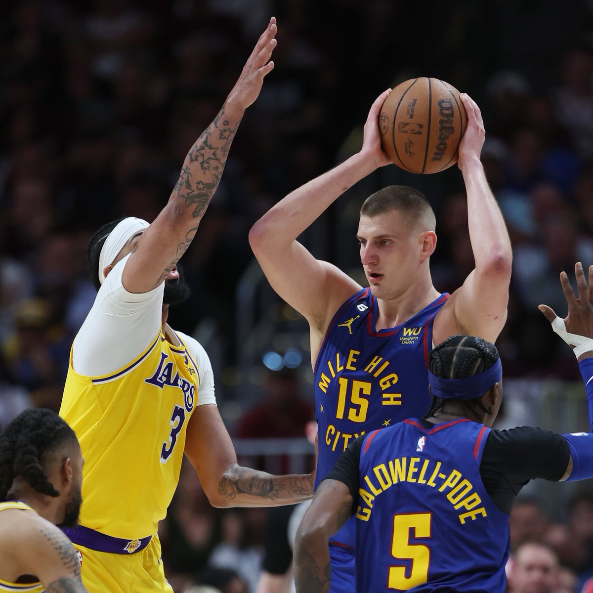 Jokic's Triple-Double Powers Denver Nuggets Past Los Angeles Lakers in Game 1  
