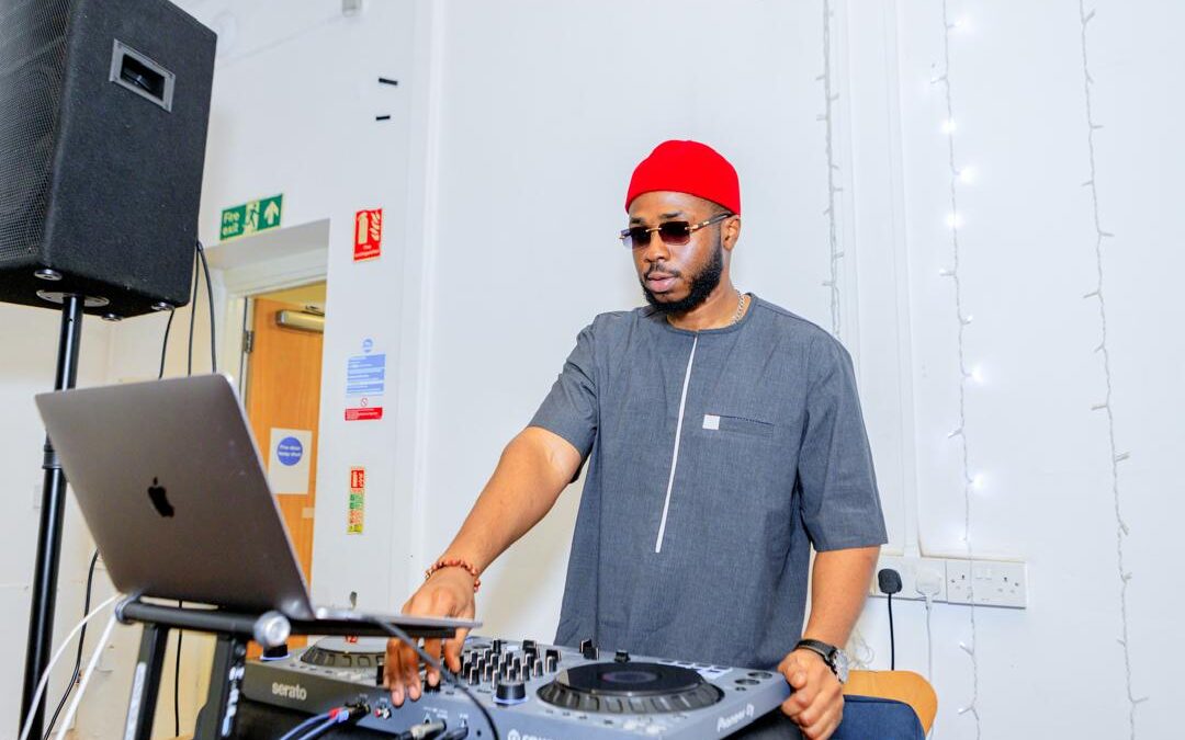 Young music producer working in studio