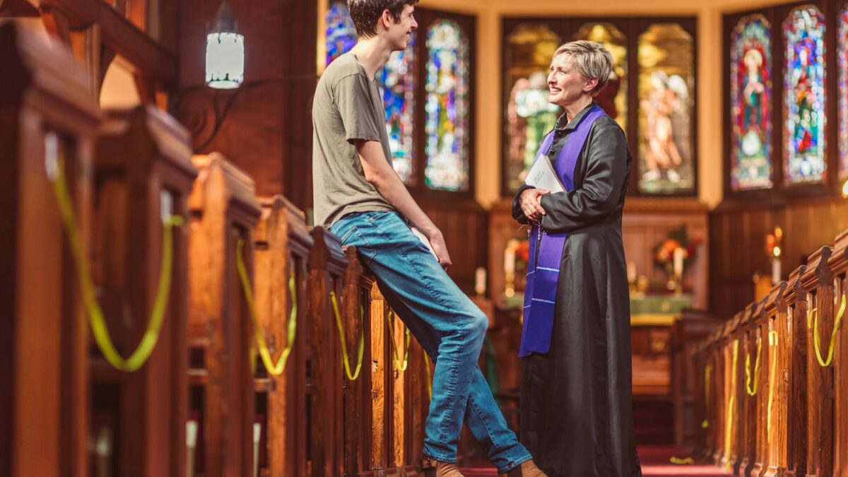 church pastor meeting congregation member