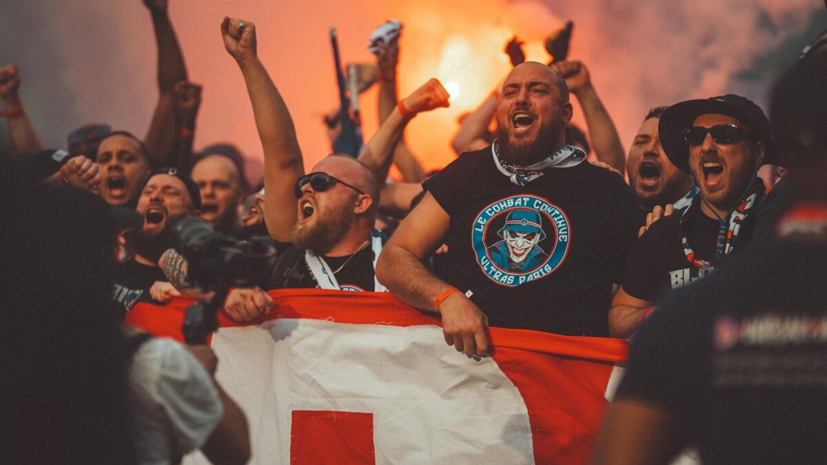 football fans celebrating riot clashes