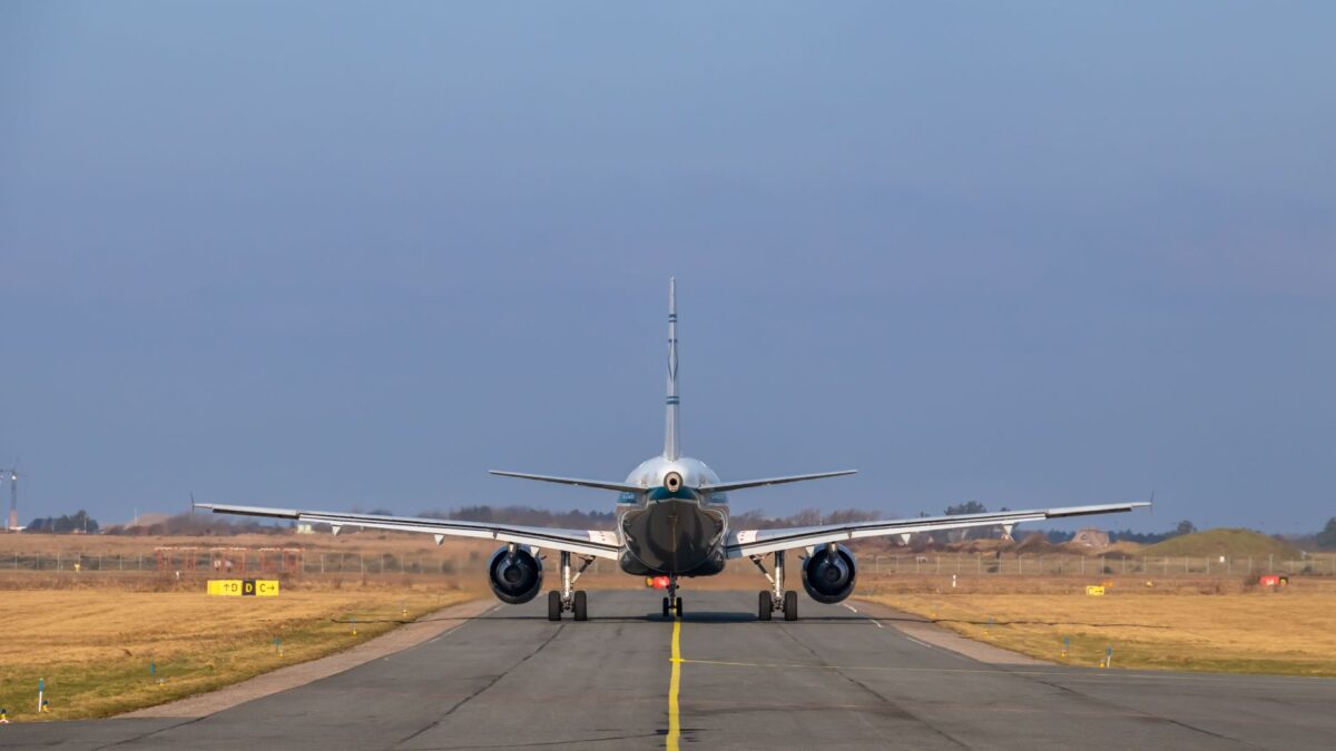 commercial airplane airport runway takeoff